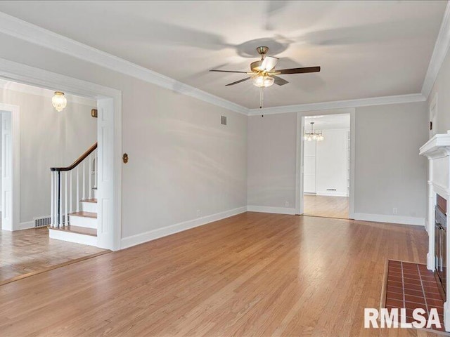 unfurnished living room with stairs, ornamental molding, a fireplace with flush hearth, and light wood-style flooring