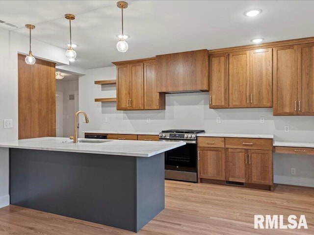 kitchen featuring a sink, light countertops, stainless steel gas range, and open shelves