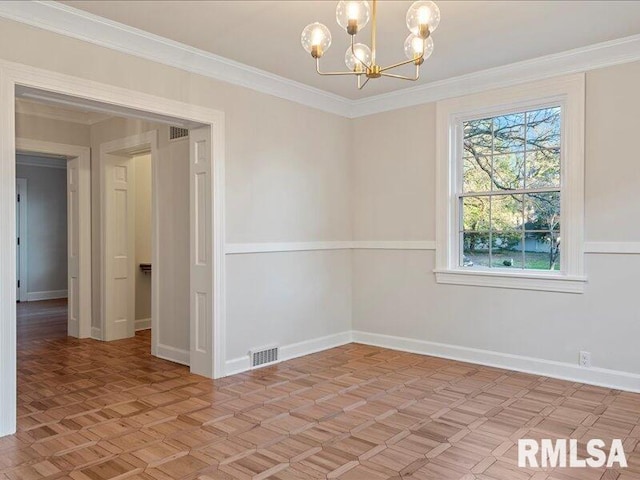 empty room featuring a notable chandelier, ornamental molding, and light parquet floors