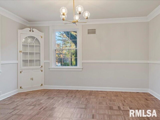 unfurnished dining area with a notable chandelier, baseboards, visible vents, and crown molding