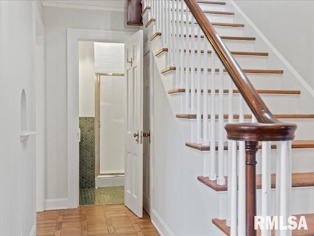 staircase with tile patterned floors