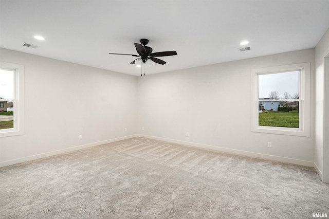 unfurnished room featuring visible vents, recessed lighting, and a ceiling fan
