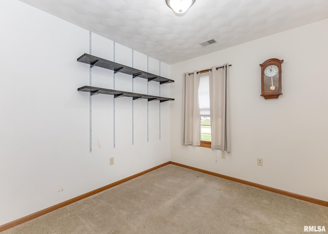 empty room with carpet flooring