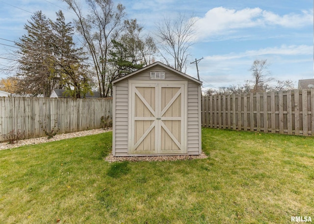 view of outbuilding with a lawn