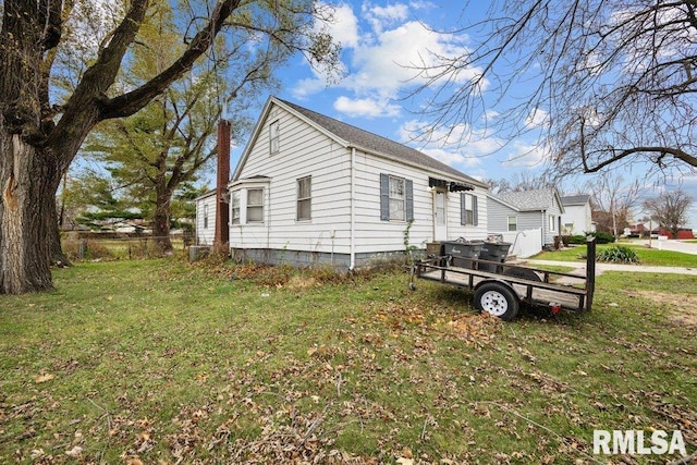 view of home's exterior featuring a yard