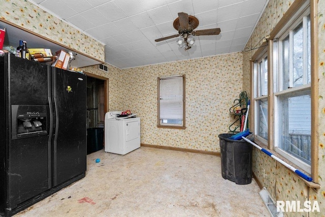 laundry room featuring carpet flooring, ceiling fan, and washer / clothes dryer