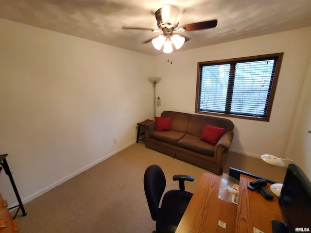 carpeted living room with ceiling fan