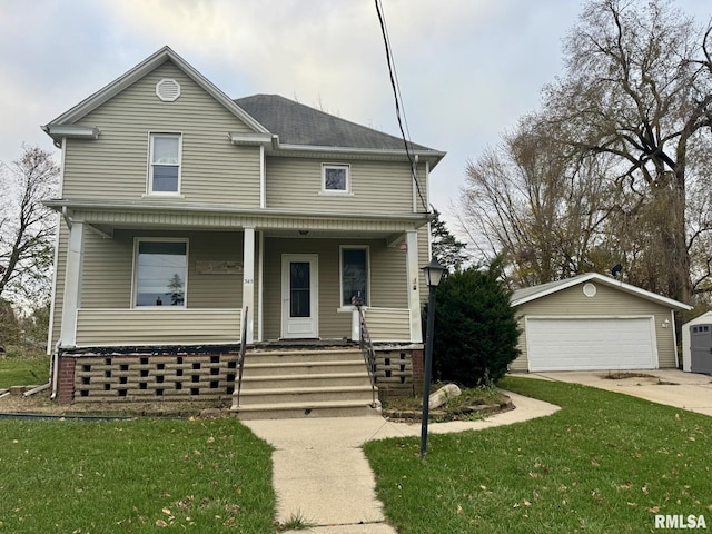 front facade with a garage, an outdoor structure, and a front yard