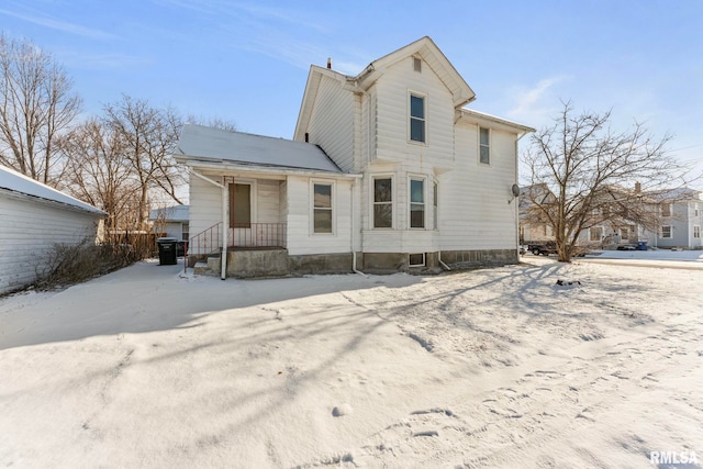 view of snow covered property