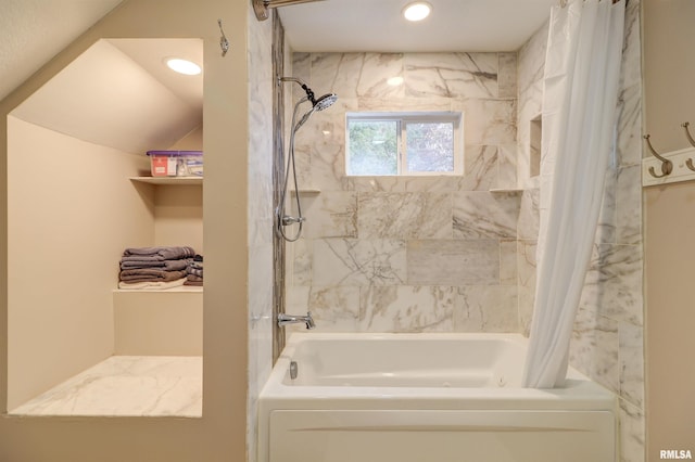 bathroom featuring shower / bath combination with curtain