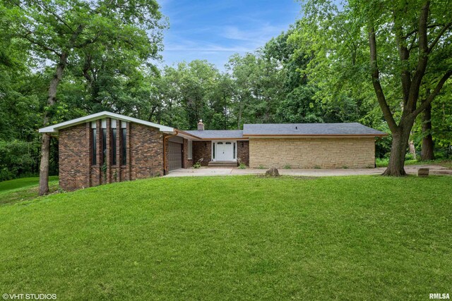 27339 Sherry Ann Ct, Donahue, IA 52746 - property entrance with brick siding