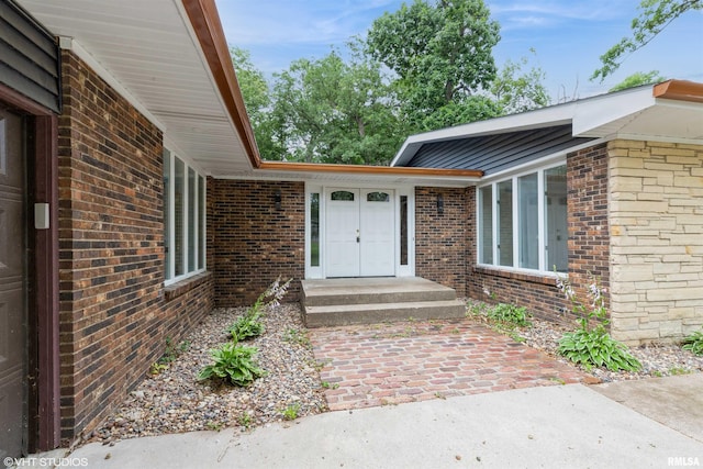 27339 Sherry Ann Ct, Donahue, IA 52746 - property entrance with brick siding