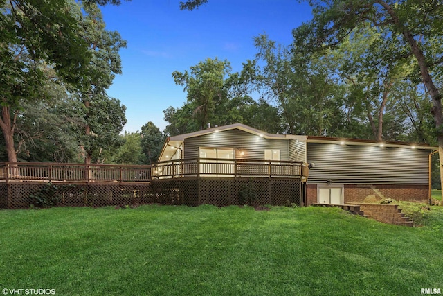 27339 Sherry Ann Ct, Donahue, IA 52746 - rear view of property with a deck and a yard
