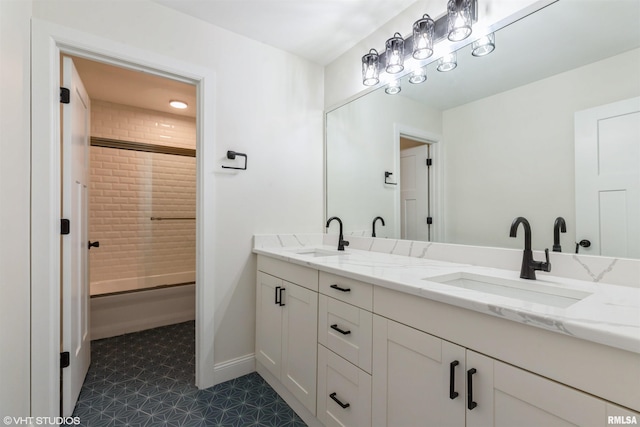 27339 Sherry Ann Ct, Donahue, IA 52746 - full bathroom with double vanity, bath / shower combo with glass door, and tile patterned floors