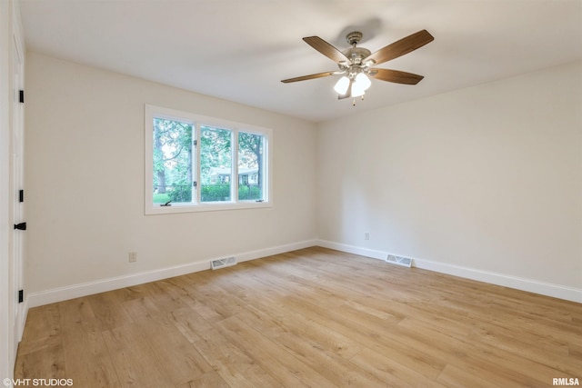 27339 Sherry Ann Ct, Donahue, IA 52746 - spare room with light wood finished floors and a ceiling fan