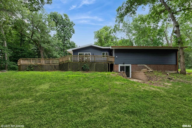 27339 Sherry Ann Ct, Donahue, IA 52746 - rear view of property featuring a deck, a lawn, and brick siding