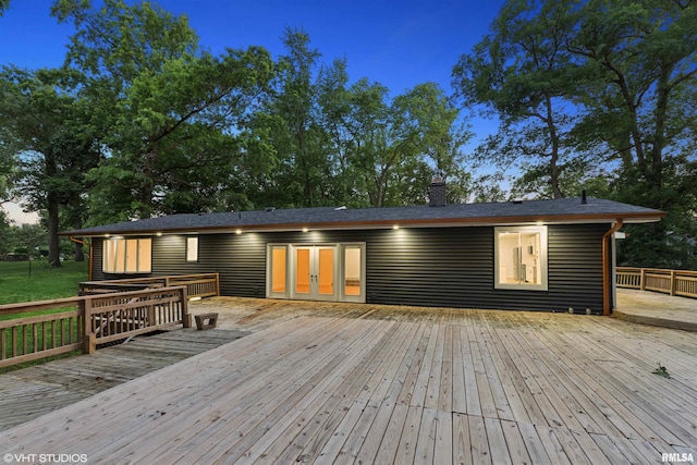 27339 Sherry Ann Ct, Donahue, IA 52746 - wooden deck with french doors
