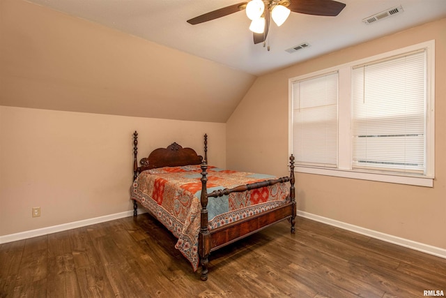 bedroom with vaulted ceiling, ceiling fan, and dark hardwood / wood-style floors