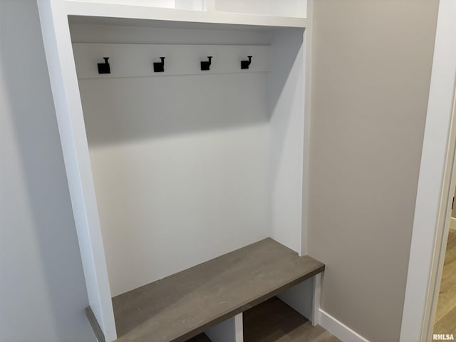 mudroom with hardwood / wood-style floors