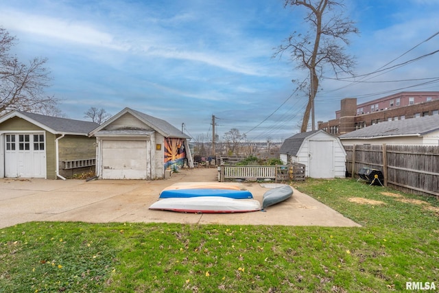 view of yard featuring a patio area and a shed