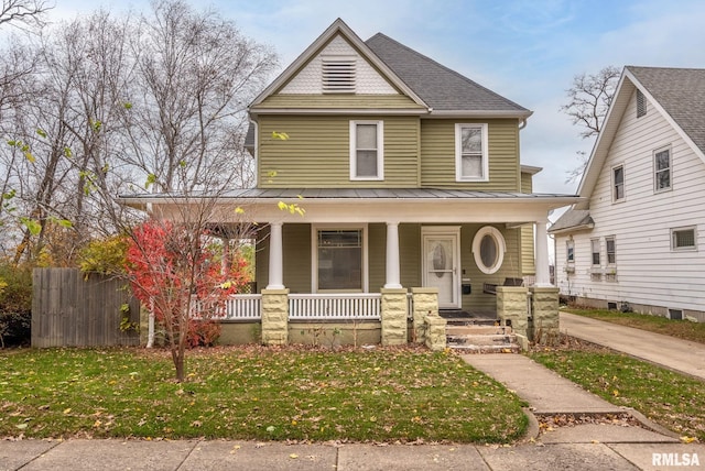 view of front of home featuring a front lawn