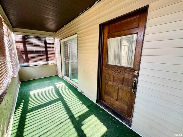 doorway to property with a porch