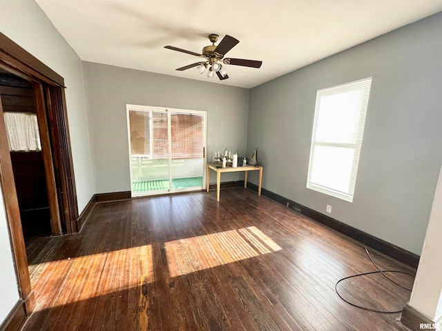 empty room featuring hardwood / wood-style flooring and ceiling fan