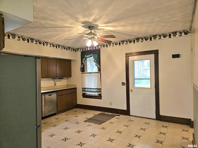 kitchen featuring dark brown cabinets, ceiling fan, and appliances with stainless steel finishes