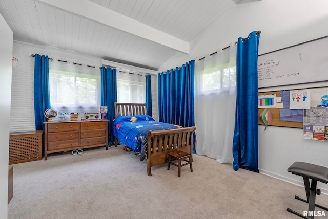 carpeted bedroom featuring vaulted ceiling with beams