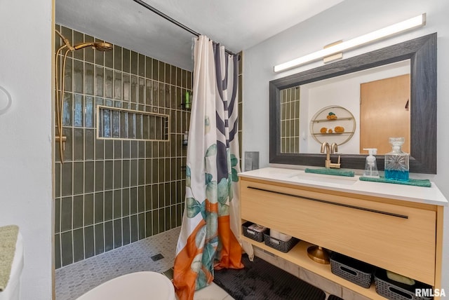 bathroom with a shower with curtain, vanity, and toilet