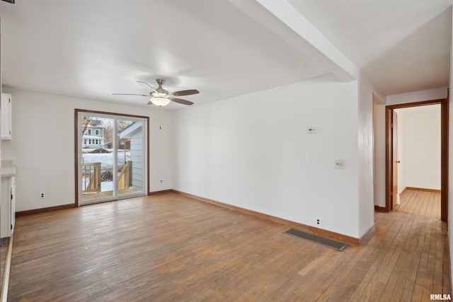 unfurnished living room with ceiling fan and light hardwood / wood-style floors