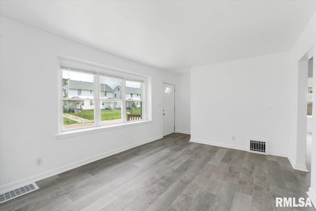 empty room featuring light hardwood / wood-style floors