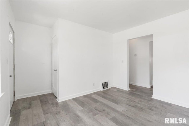 unfurnished room featuring light hardwood / wood-style floors