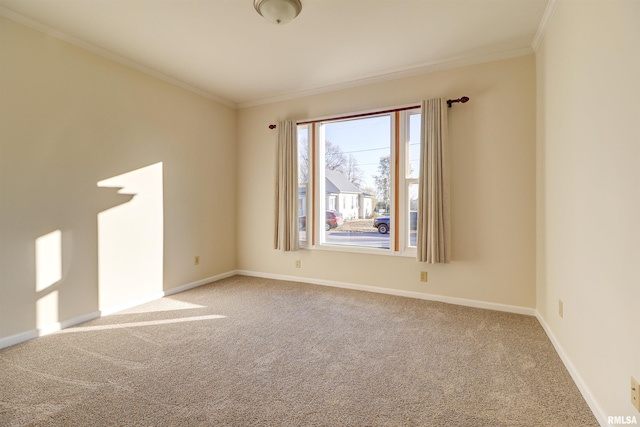 unfurnished room with light colored carpet and ornamental molding