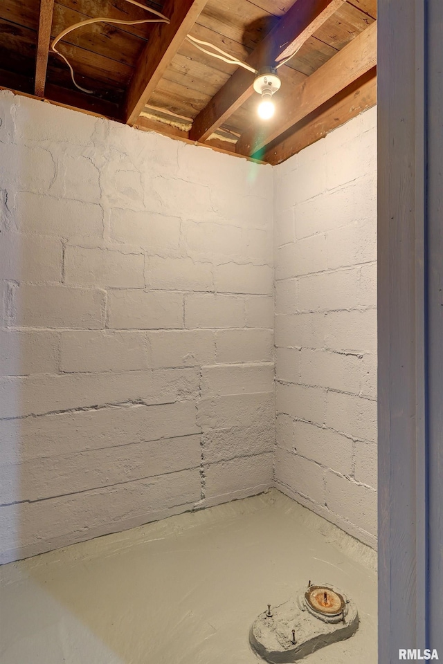 basement featuring wood ceiling