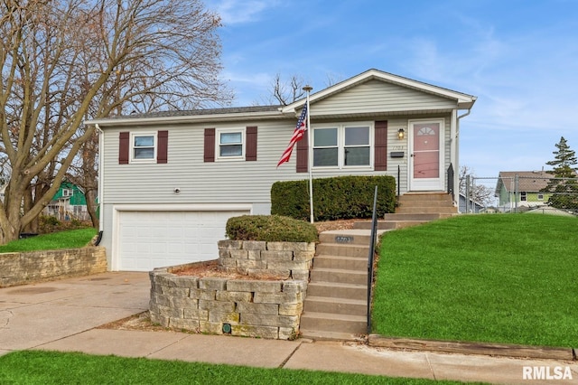 view of front of property with a garage and a front lawn