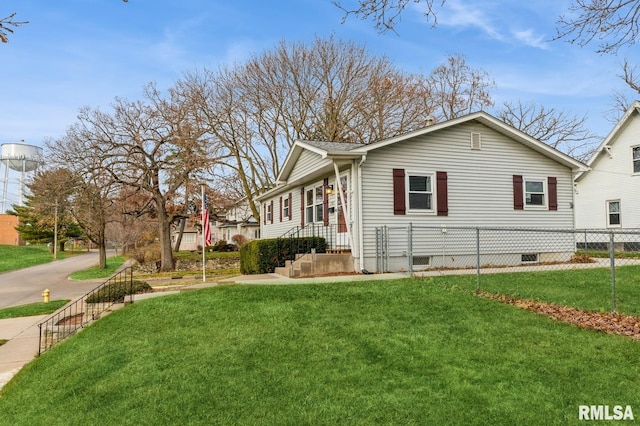 view of side of property with a yard