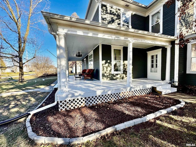 rear view of house with a porch