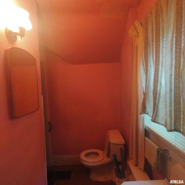 bathroom featuring toilet