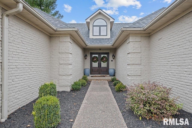 doorway to property featuring french doors