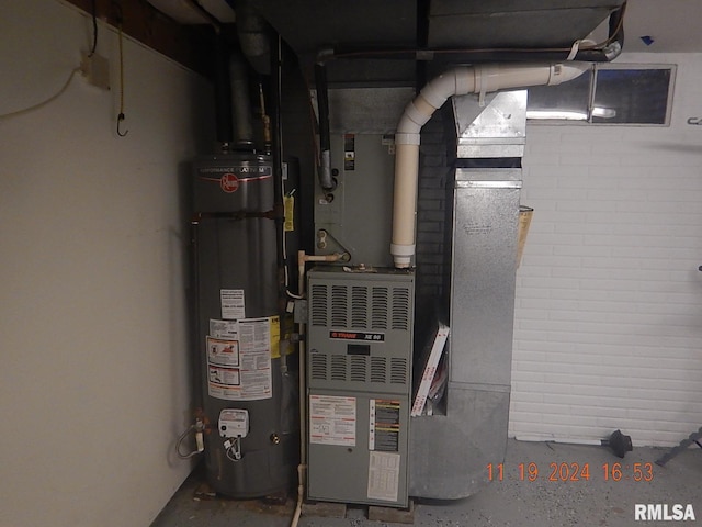 utility room with gas water heater