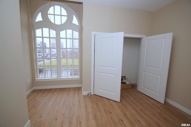 unfurnished bedroom featuring light hardwood / wood-style flooring