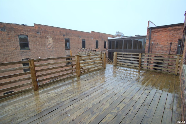 deck with a sunroom