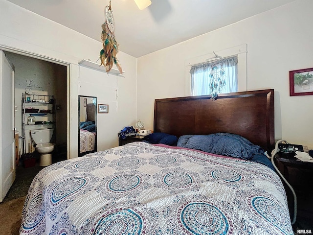 bedroom with ceiling fan and carpet floors