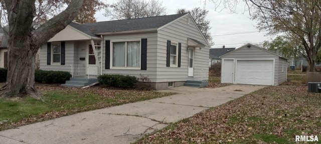 view of front facade with an outbuilding and a garage