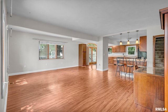 living room with light hardwood / wood-style floors