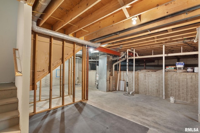 basement featuring heating unit