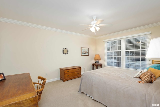 bedroom featuring ceiling fan, ornamental molding, and light carpet