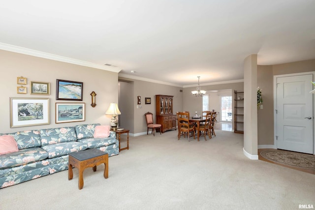 carpeted living room featuring a notable chandelier and ornamental molding