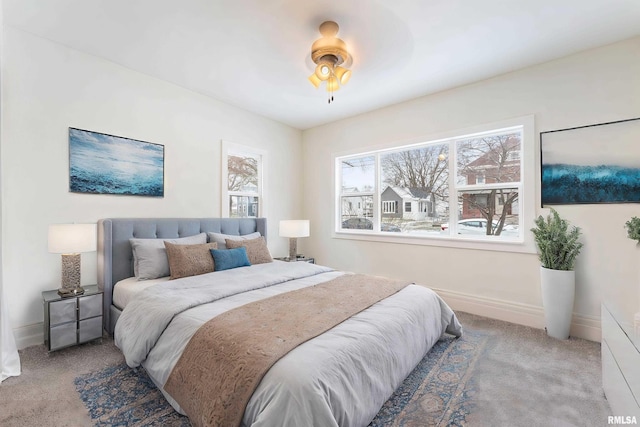 bedroom with carpet flooring and ceiling fan